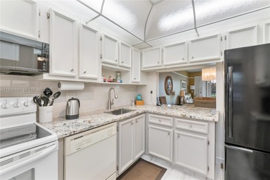 Beautifully furnished unit in 55+ community overlooking the golf on Oriole Golf and Tennis Club in Florida - for sale on GolfHomes.com, golf home, golf lot