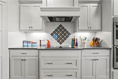This stunning reverse 1.5 story offers 4 spacious bedrooms, 3 on The Deuce At the National Golf Club of Kansas City in Missouri - for sale on GolfHomes.com, golf home, golf lot