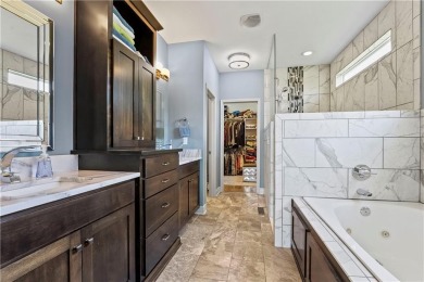 This stunning reverse 1.5 story offers 4 spacious bedrooms, 3 on The Deuce At the National Golf Club of Kansas City in Missouri - for sale on GolfHomes.com, golf home, golf lot