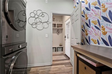 This stunning reverse 1.5 story offers 4 spacious bedrooms, 3 on The Deuce At the National Golf Club of Kansas City in Missouri - for sale on GolfHomes.com, golf home, golf lot