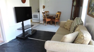 Great first floor fixer-upper opportunity! This 2 bedroom, 1 on On Top Of The World Golf Course in Florida - for sale on GolfHomes.com, golf home, golf lot