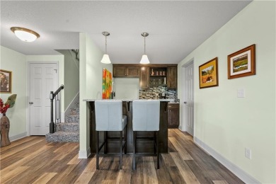 This stunning reverse 1.5 story offers 4 spacious bedrooms, 3 on The Deuce At the National Golf Club of Kansas City in Missouri - for sale on GolfHomes.com, golf home, golf lot