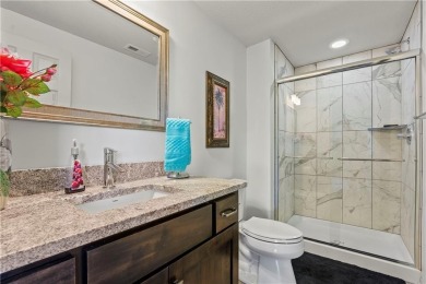 This stunning reverse 1.5 story offers 4 spacious bedrooms, 3 on The Deuce At the National Golf Club of Kansas City in Missouri - for sale on GolfHomes.com, golf home, golf lot