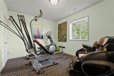 This stunning reverse 1.5 story offers 4 spacious bedrooms, 3 on The Deuce At the National Golf Club of Kansas City in Missouri - for sale on GolfHomes.com, golf home, golf lot