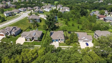 This stunning reverse 1.5 story offers 4 spacious bedrooms, 3 on The Deuce At the National Golf Club of Kansas City in Missouri - for sale on GolfHomes.com, golf home, golf lot