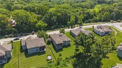 This stunning reverse 1.5 story offers 4 spacious bedrooms, 3 on The Deuce At the National Golf Club of Kansas City in Missouri - for sale on GolfHomes.com, golf home, golf lot