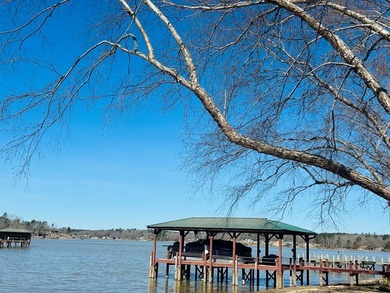 Discover the perfect blend of elegance and lakefront living in on The Links At Stoney Point in South Carolina - for sale on GolfHomes.com, golf home, golf lot