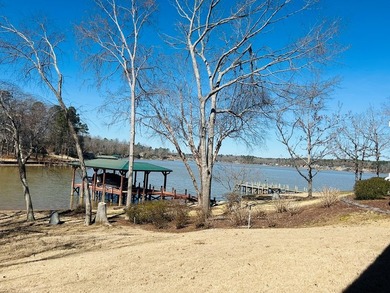 Discover the perfect blend of elegance and lakefront living in on The Links At Stoney Point in South Carolina - for sale on GolfHomes.com, golf home, golf lot