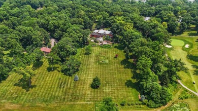 Set on over five private acres with commanding views of the 13th on Springfield Country Club in Ohio - for sale on GolfHomes.com, golf home, golf lot