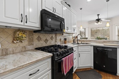 Discover the perfect blend of elegance and lakefront living in on The Links At Stoney Point in South Carolina - for sale on GolfHomes.com, golf home, golf lot