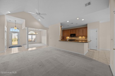 Welcome to **8887 Lansdowne Drive**, a beautiful home in the on Brunswick Plantation and Golf Resorts in North Carolina - for sale on GolfHomes.com, golf home, golf lot