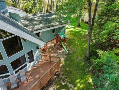 Welcome to 111 Birchwood Drive -- a stunning Lindell cedar home on The Briar South At Lakewood in Michigan - for sale on GolfHomes.com, golf home, golf lot