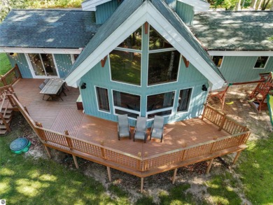 Welcome to 111 Birchwood Drive -- a stunning Lindell cedar home on The Briar South At Lakewood in Michigan - for sale on GolfHomes.com, golf home, golf lot