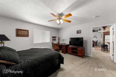 Discover the perfect blend of comfort and convenience in this on Beaver Dam Resort in Arizona - for sale on GolfHomes.com, golf home, golf lot