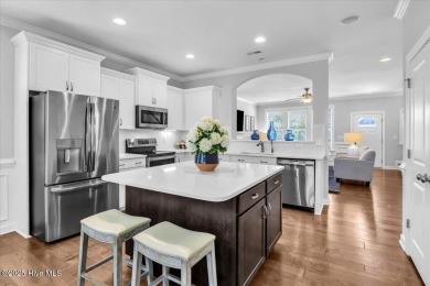 This two-story coastal craftsman style house is a rare on Beau Rivage Golf and Resort in North Carolina - for sale on GolfHomes.com, golf home, golf lot