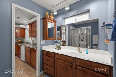Discover the perfect blend of comfort and convenience in this on Beaver Dam Resort in Arizona - for sale on GolfHomes.com, golf home, golf lot