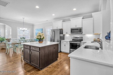 This two-story coastal craftsman style house is a rare on Beau Rivage Golf and Resort in North Carolina - for sale on GolfHomes.com, golf home, golf lot
