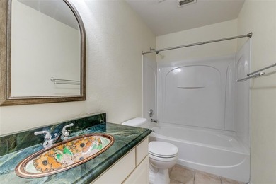 HUGE BACKYARD ON THE GOLF COURSE! Beautiful wood and rod iron on Jim Boggs in Texas - for sale on GolfHomes.com, golf home, golf lot