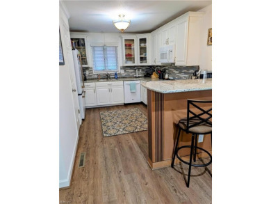 This charming condo is located on the 14th Fairway with on Cypress Point Country Club in Virginia - for sale on GolfHomes.com, golf home, golf lot