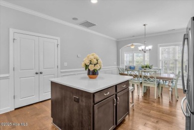 This two-story coastal craftsman style house is a rare on Beau Rivage Golf and Resort in North Carolina - for sale on GolfHomes.com, golf home, golf lot