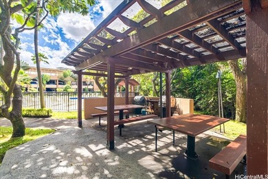 This bright and breezy corner unit features an open floorplan on Honolulu Country Club in Hawaii - for sale on GolfHomes.com, golf home, golf lot