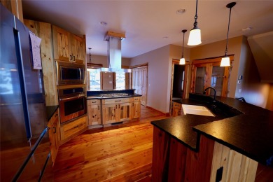 Naturally Beautiful with Artisan Aesthetic...
Earthy grounded on Double Arrow Lodge in Montana - for sale on GolfHomes.com, golf home, golf lot