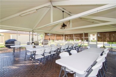 This second floor unit has upgraded luxury vinyl flooring on Vista Plantation Golf Club in Florida - for sale on GolfHomes.com, golf home, golf lot