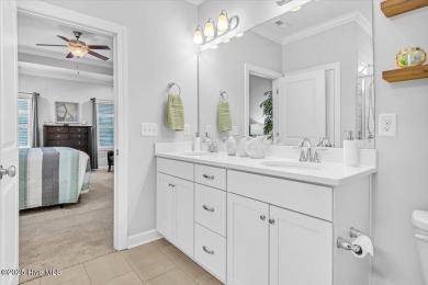 This two-story coastal craftsman style house is a rare on Beau Rivage Golf and Resort in North Carolina - for sale on GolfHomes.com, golf home, golf lot
