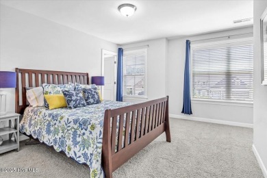 This two-story coastal craftsman style house is a rare on Beau Rivage Golf and Resort in North Carolina - for sale on GolfHomes.com, golf home, golf lot
