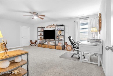 This two-story coastal craftsman style house is a rare on Beau Rivage Golf and Resort in North Carolina - for sale on GolfHomes.com, golf home, golf lot