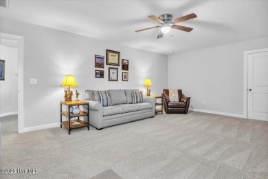 This two-story coastal craftsman style house is a rare on Beau Rivage Golf and Resort in North Carolina - for sale on GolfHomes.com, golf home, golf lot