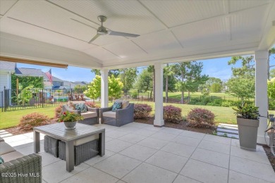 This two-story coastal craftsman style house is a rare on Beau Rivage Golf and Resort in North Carolina - for sale on GolfHomes.com, golf home, golf lot