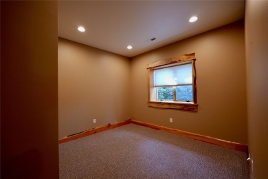 Naturally Beautiful with Artisan Aesthetic... Earthy grounded on Double Arrow Lodge in Montana - for sale on GolfHomes.com, golf home, golf lot