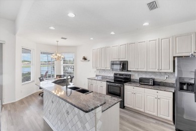 MUST SEE!  GORGEOUS LAKE VIEWS WITH SUNSET EXPOSURE!  DON'T MISS on Pelican Pointe Golf and Country Club in Florida - for sale on GolfHomes.com, golf home, golf lot