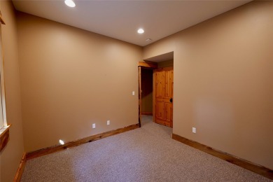 Naturally Beautiful with Artisan Aesthetic... Earthy grounded on Double Arrow Lodge in Montana - for sale on GolfHomes.com, golf home, golf lot