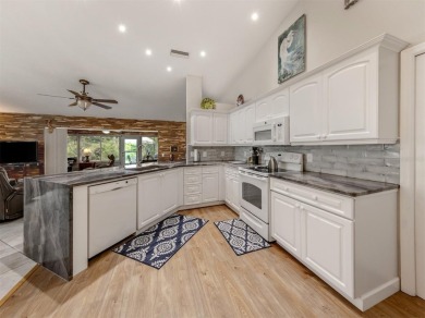 Welcome to your private retreat tucked away on a peaceful on Venice East Golf Club in Florida - for sale on GolfHomes.com, golf home, golf lot
