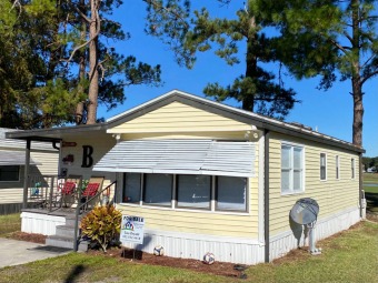 THIS CUTE PARK MODEL HOME HAS BEEN CONVERTED TO A 3 BEDROOM 1 on Clerbrook Golf Club in Florida - for sale on GolfHomes.com, golf home, golf lot