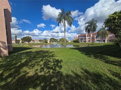 Spacious 1-bedroom, 1.5-bath first-floor condo offering serene on Sunrise Lakes Phase III in Florida - for sale on GolfHomes.com, golf home, golf lot