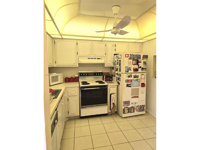 Spacious 1-bedroom, 1.5-bath first-floor condo offering serene on Sunrise Lakes Phase III in Florida - for sale on GolfHomes.com, golf home, golf lot