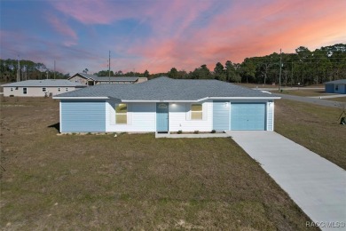 This new construction home has 4 bedrooms and two full bathrooms on Citrus Springs Country Club in Florida - for sale on GolfHomes.com, golf home, golf lot