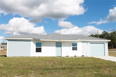 This new construction home has 4 bedrooms and two full bathrooms on Citrus Springs Country Club in Florida - for sale on GolfHomes.com, golf home, golf lot