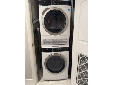 PHASE II - GORGEOUS FIRST FLOOR 1BR/1.5 BA UNIT. FULLY on Hollybrook Golf and Tennis Club  in Florida - for sale on GolfHomes.com, golf home, golf lot