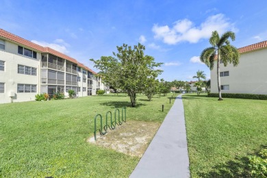 PHASE II - GORGEOUS FIRST FLOOR 1BR/1.5 BA UNIT. FULLY on Hollybrook Golf and Tennis Club  in Florida - for sale on GolfHomes.com, golf home, golf lot