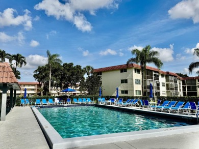 PHASE II - GORGEOUS FIRST FLOOR 1BR/1.5 BA UNIT. FULLY on Hollybrook Golf and Tennis Club  in Florida - for sale on GolfHomes.com, golf home, golf lot