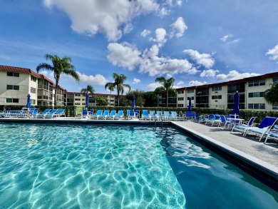 PHASE II - GORGEOUS FIRST FLOOR 1BR/1.5 BA UNIT. FULLY on Hollybrook Golf and Tennis Club  in Florida - for sale on GolfHomes.com, golf home, golf lot