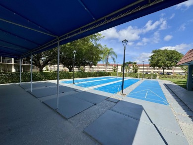 PHASE II - GORGEOUS FIRST FLOOR 1BR/1.5 BA UNIT. FULLY on Hollybrook Golf and Tennis Club  in Florida - for sale on GolfHomes.com, golf home, golf lot