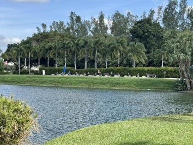 PHASE II - GORGEOUS FIRST FLOOR 1BR/1.5 BA UNIT. FULLY on Hollybrook Golf and Tennis Club  in Florida - for sale on GolfHomes.com, golf home, golf lot