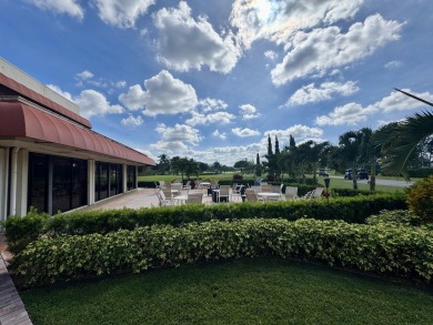 PHASE II - GORGEOUS FIRST FLOOR 1BR/1.5 BA UNIT. FULLY on Hollybrook Golf and Tennis Club  in Florida - for sale on GolfHomes.com, golf home, golf lot