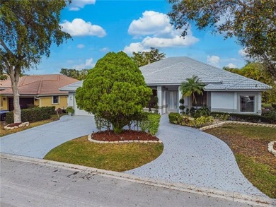 Beautiful 4 bed, 3.5 bath pool home in prestigious guard-gated on TPC Eagle Trace in Florida - for sale on GolfHomes.com, golf home, golf lot