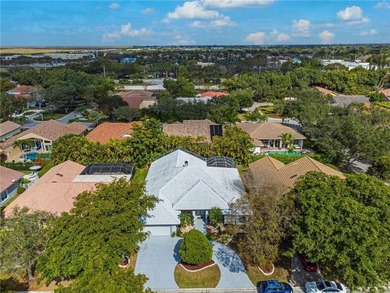 Beautiful 4 bed, 3.5 bath pool home in prestigious guard-gated on TPC Eagle Trace in Florida - for sale on GolfHomes.com, golf home, golf lot